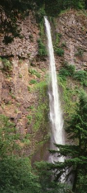 A high waterfall plumments from a tributary into Eagle Creek.