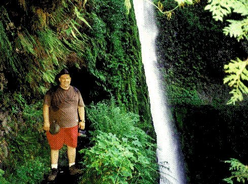 I emerge from the tunnel behind Tunnel Falls. The wet shirt is from water dripping from the ceiling.